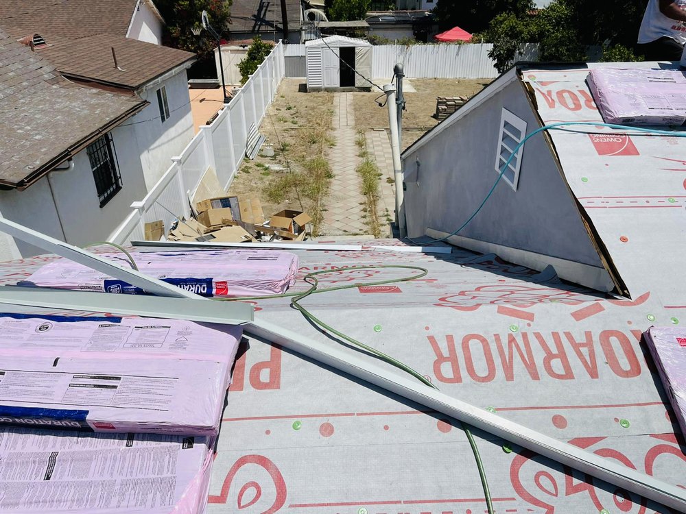 Slide of Almighty Roofing