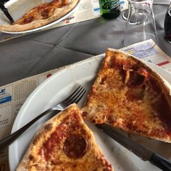 Primavera - Food is fair-good. Lousy service to Americans. If you're starving, eat in Venice proper. DISAPPOINTED! Not the worst food. Wood fired pizza.