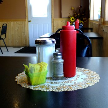 Restaurant 24 Hours - a table with condiments on it - Diners Near Me - Campbellton, New Brunswick Restaurant 24 Hours - a table with condiments on it - Diners Near Me - Campbellton, New Brunswick