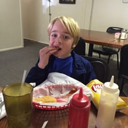 Sammie's - My brother finishing off some of the food. For some reason he asked for potato chips.