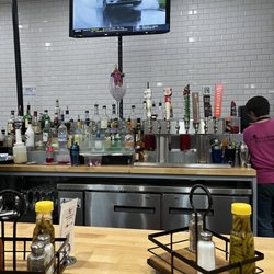 Southern Gourmet Kitchen - More of the bar and TVs