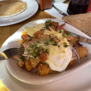 Main Street Bistro - My friend asparagus. Don't be misled by the name of this dish and description. There is basically sprinkle asparagus instead of scallion! - Breakfast & Brunch Near Me - New Paltz, New York