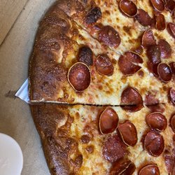 Monroe Pizza & Pints - I would have given the customer an option to remake the pizza instead of just knowingly sending a pizza burnt to a crisp out the door