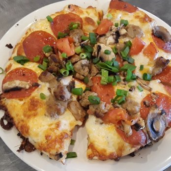 Round Table Pizza - This personal pizza took 90 minutes to make and cost $10.99. Tasty but not worth it. - Pizza Near Me - Kailua, Hawaii
