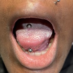 Wyld Chyld Tattoo - Tongue piercing