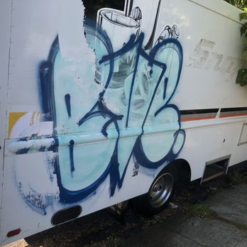 Chuck's Pressure Washing Services - Before with the years of sun baked on decals and recent graffiti - Pressure Washers Near Me - Antioch, California