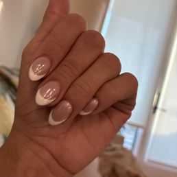 Jason was awesome.  He did white tips and chrome.  This was a fill from a different salon and did an amazing job.