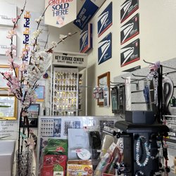Postal Etc USA - Keys, money orders, and other knickknacks for sale