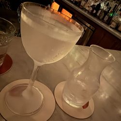 Bisous - Freezer Martini - Morning Blossom - Gin Lane Old Tom, Koval Gin, Smoked Mango Brandy, Blanc and Dry Vermouths cold & curious