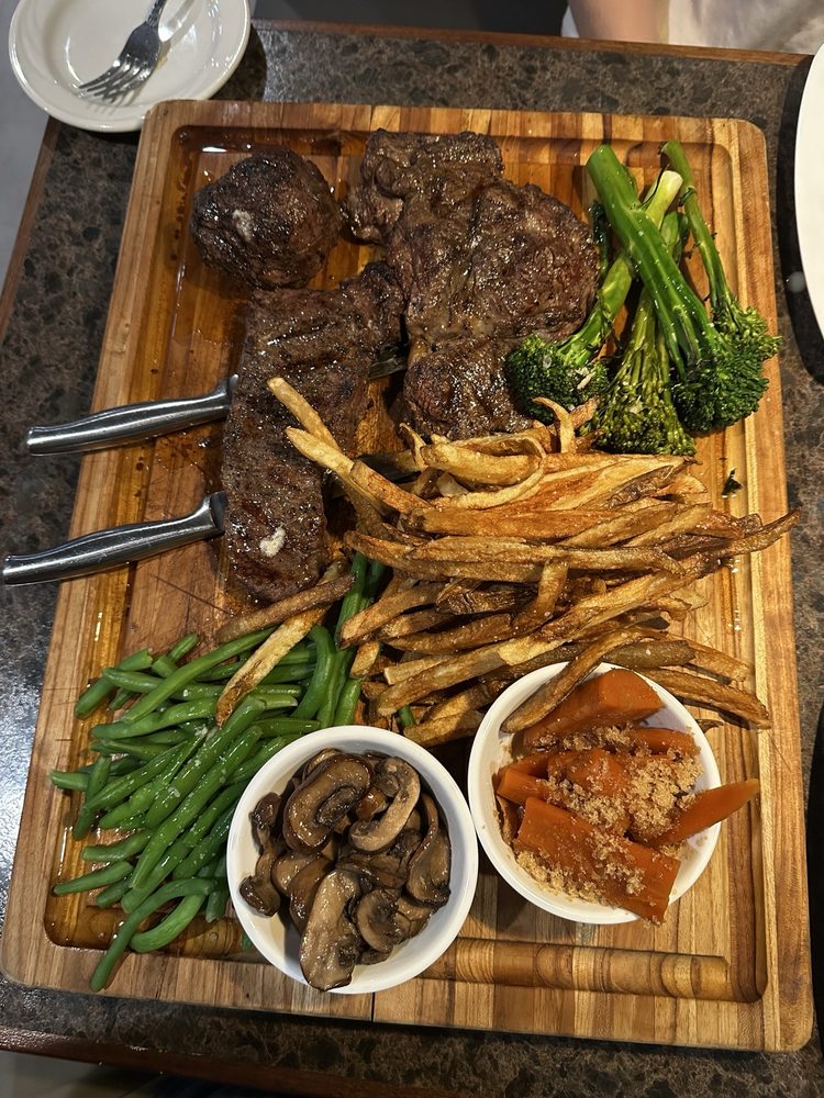 The Farmer Butcher Chef Steakhouse Logo