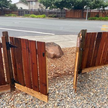 C and J Yard Care Maintenance - a wooden fence and a rock - Lawn Services Near Me C and J Yard Care Maintenance - a wooden fence and a rock - Lawn Services Near Me