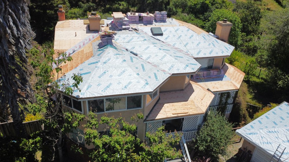 Slide of Six Star Roofing