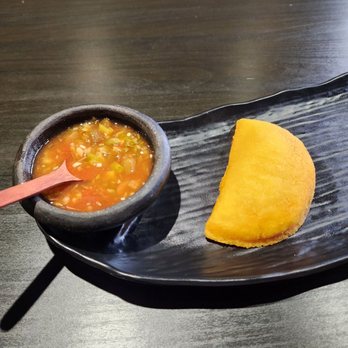 The Toston - Beef empanada and salsa - Colombian Near Me - Markham, Ontario The Toston - Beef empanada and salsa - Colombian Near Me - Markham, Ontario