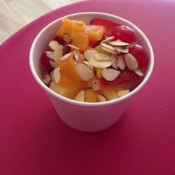 Yogalicious - Yellow Cake Batter and Graham Cracker frozen yogurt with fruit and almond toppings, YUM!!!