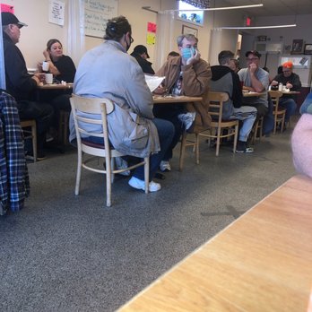 Debbie's Restaurant - Showing the attempt to separate some tables, however the tables next to the separated ones are only about 2 feet apart - New American Near Me - Dayton, Ohio