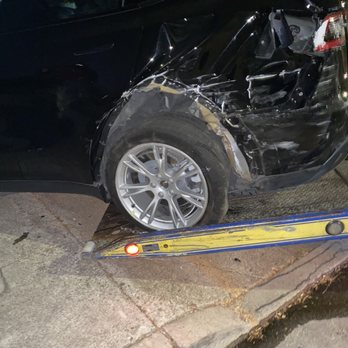 Los Cuates Towing Services - Tesla hit at high speed while parked. Broken suspension/ accident tow. - Towing Near Me - Oakland, California Los Cuates Towing Services - Tesla hit at high speed while parked. Broken suspension/ accident tow. - Towing Near Me - Oakland, California