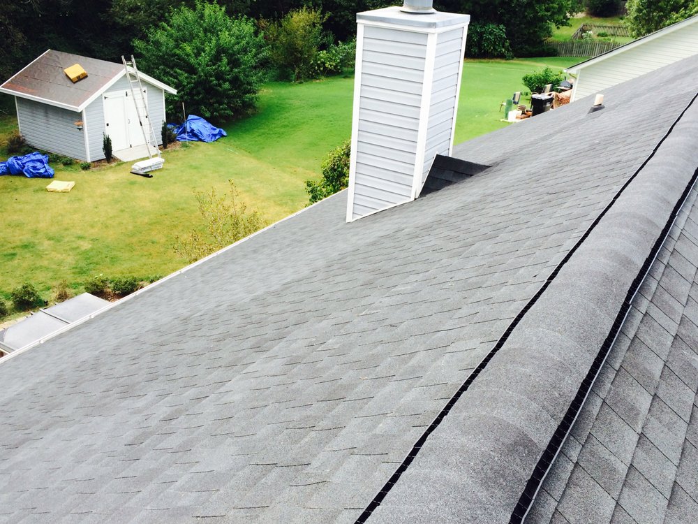 Slide of Dave Clark Roofing