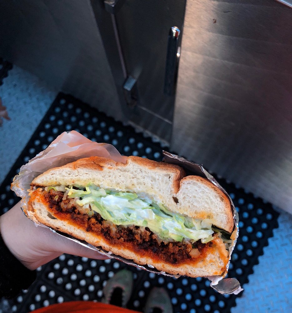 Tacos El Mezquite Logo