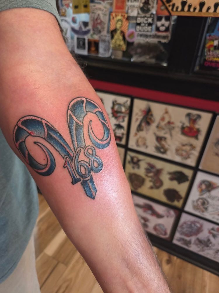 Iron Flag Tattoo Logo