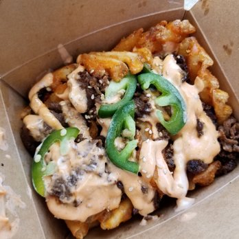 Mad Dumplings - Bulgogi waffle fries (half portion) - Food Trucks Near Me - Santa Ana, California Mad Dumplings - Bulgogi waffle fries (half portion) - Food Trucks Near Me - Santa Ana, California