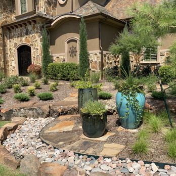 Green Meadow Landscaping - a house with a stone pathway - Landscaping Near Me - Lewisville, Texas Green Meadow Landscaping - a house with a stone pathway - Landscaping Near Me - Lewisville, Texas