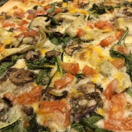 a close up of a pizza