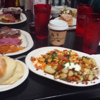 Sax's Joint - A happy family eats at Sax's! Featured is a chorizo scramble of some kind, and two orders of their famous french toast. - Breakfast & Brunch Near Me - Petaluma, California