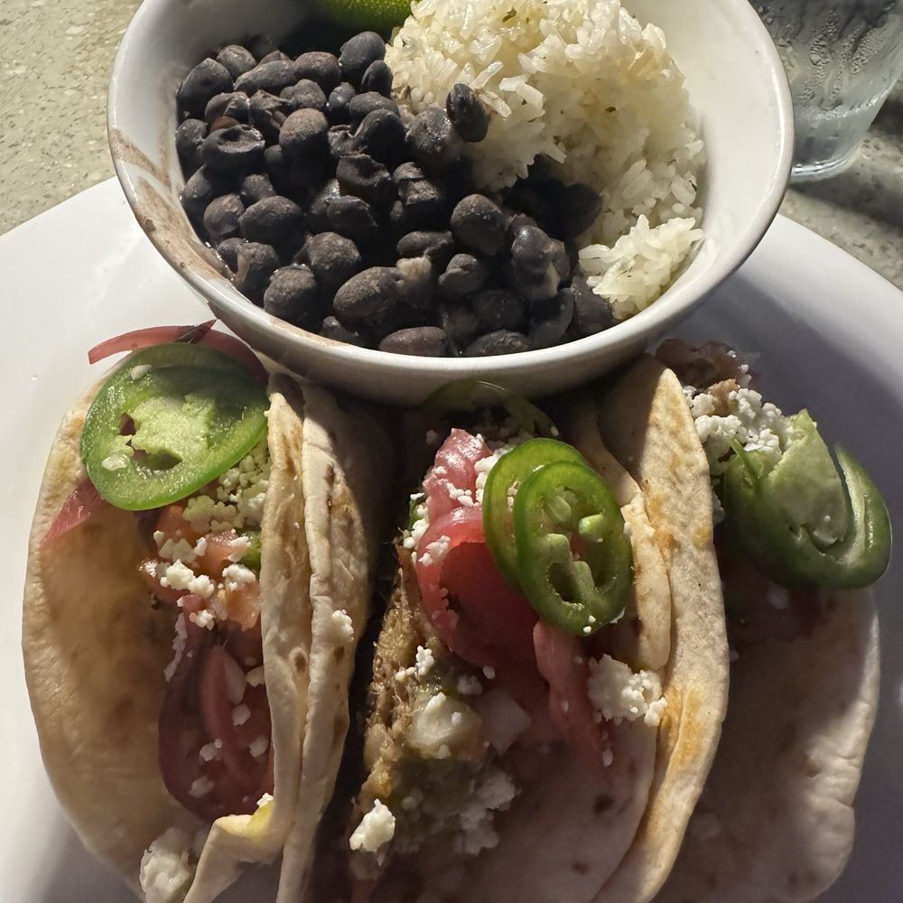 Sunset Grill - Mojo pork tacos with cilantro rice and beans - Casinos Near Me - Coconut Creek, Florida Sunset Grill - Mojo pork tacos with cilantro rice and beans - Casinos Near Me - Coconut Creek, Florida