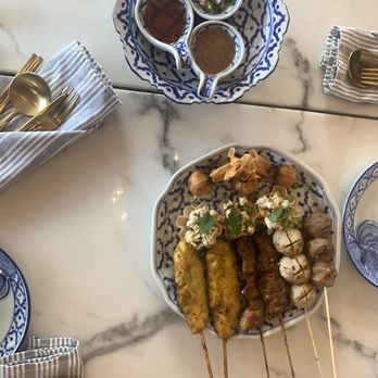 Kin Dee - ALL IN ONE appetizers: Money Bags, Golden Baskets, Grilled Thai Meatballs, Chicken Satay, Grilled Pork Skewers - Thai Near Me - Houston, Texas Kin Dee - ALL IN ONE appetizers: Money Bags, Golden Baskets, Grilled Thai Meatballs, Chicken Satay, Grilled Pork Skewers - Thai Near Me - Houston, Texas