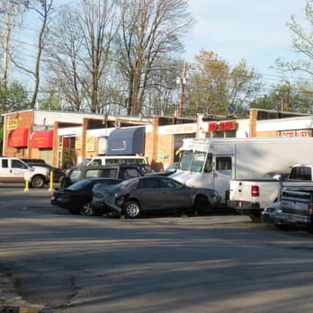 Red Ginger - a wide view of Summit Ave. (note the beat up cars and Red Ginger in the middle of the shot) - Asian Fusion Near Me - Kensington, Maryland