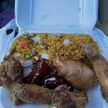 Wingloon - a styrofoam takeout container with chicken and rice - Chinese Near Me - Oakland Park, Florida