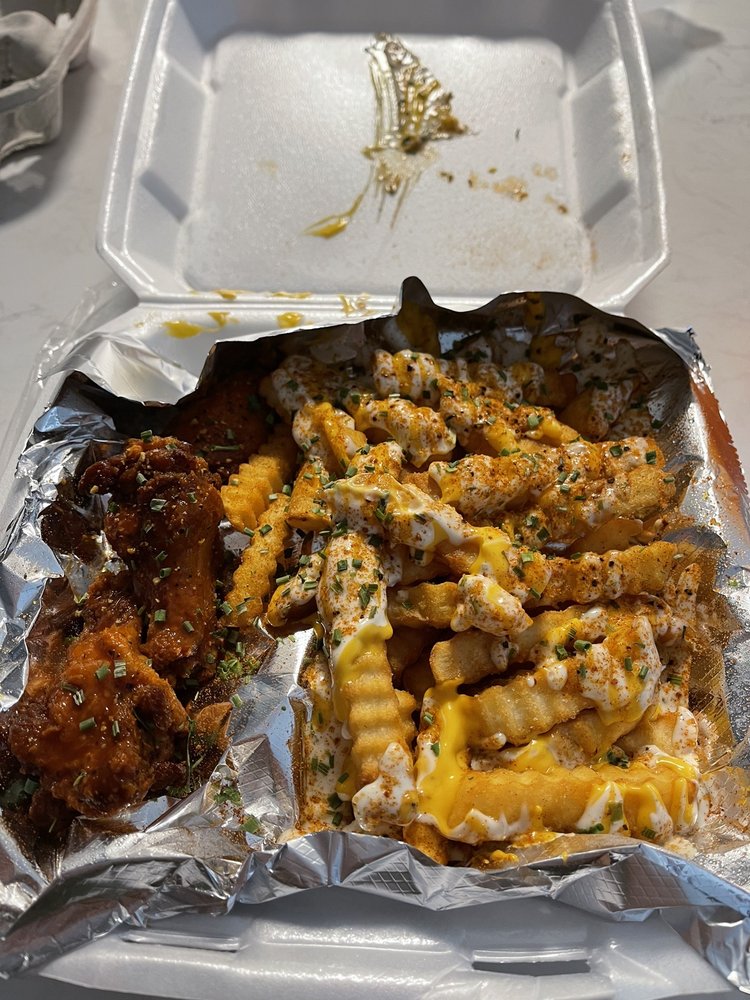 Hot Lemon Pepper wings and ranch, cheese and cajun fries Yelp