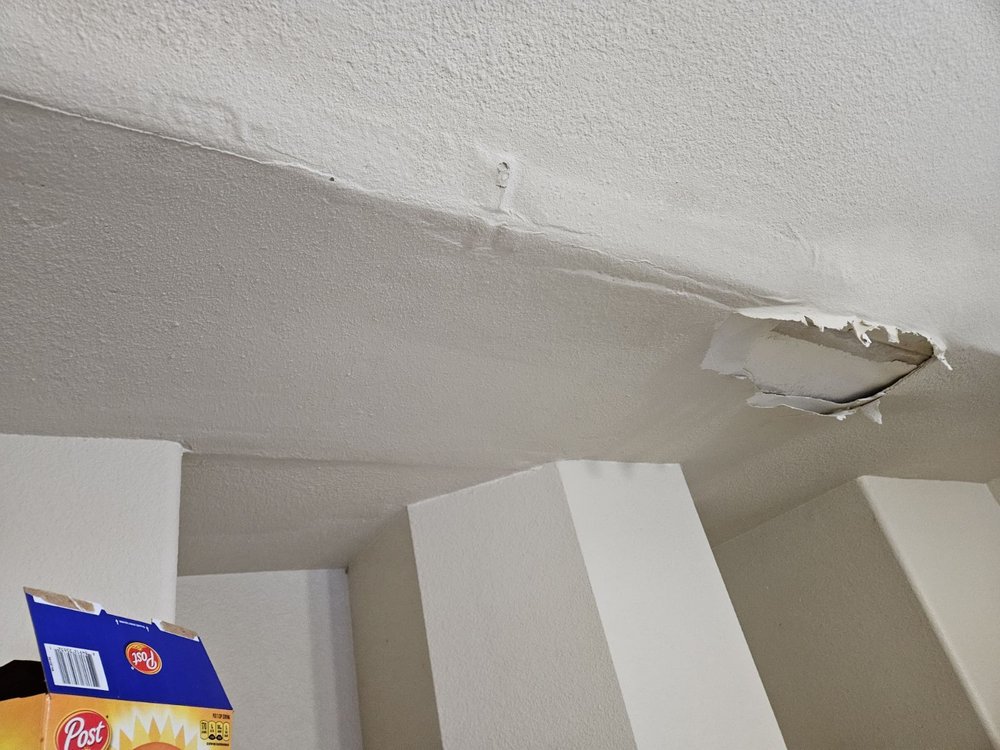 Slide of Green's Roofing