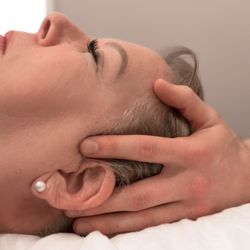 Cranial Osteopathy: gentle manipulation of the skull and its structures to promote healing and overall well-being.