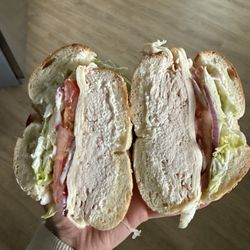 Bagel Hut - Turkey, Muenster, lettuce, tomato, onion, mayo on a sesame bagel