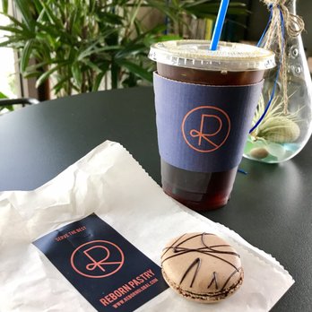 Reborn Coffee - Cold brew (Ethiopian) and a macaron(Belgium chocolate). - Coffee & Tea Near Me - Brea, California Reborn Coffee - Cold brew (Ethiopian) and a macaron(Belgium chocolate). - Coffee & Tea Near Me - Brea, California