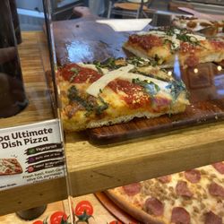 Golden Grain Pizza - Gourmet pizza slices to go