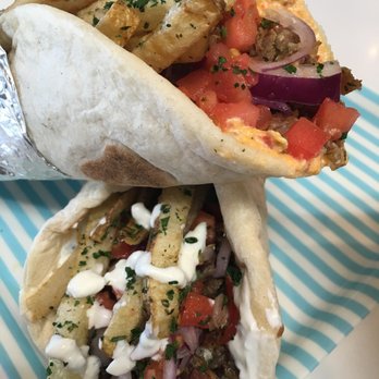 Pita - A couple fan favorites - the Fiery Greek Gyro and The Traditional - Salad Near Me - Chelmsford, Massachusetts Pita - A couple fan favorites - the Fiery Greek Gyro and The Traditional - Salad Near Me - Chelmsford, Massachusetts