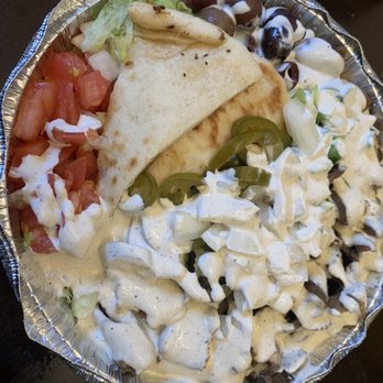 The Halal Guys - Combo platter with olives, tomatoes, peppers, onions and jalapeños - Halal Near Me - Fort Lee, New Jersey