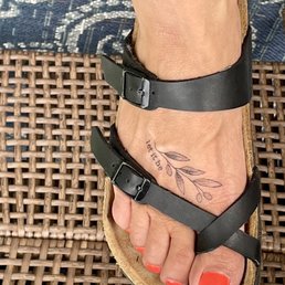 Fine line tattoo