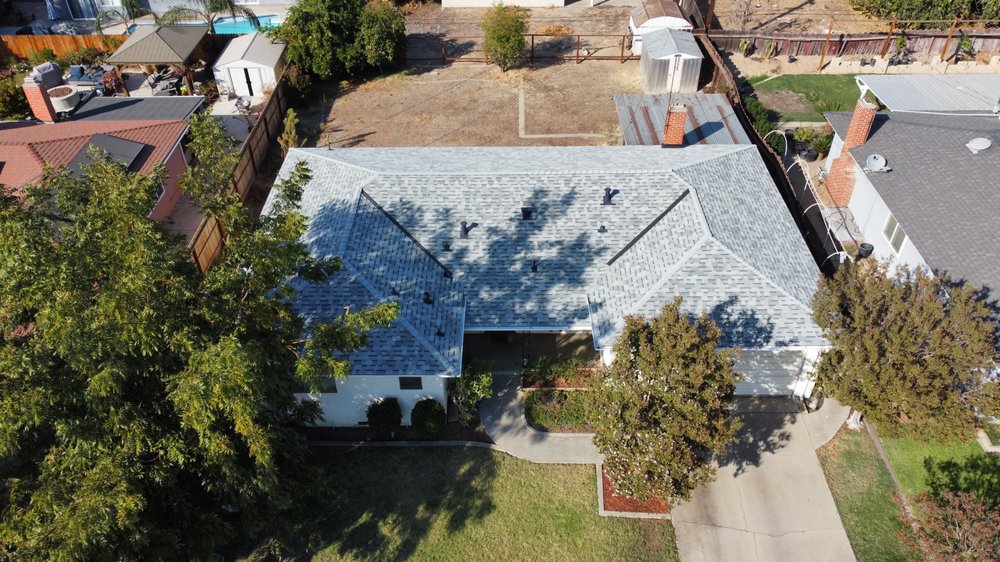 Slide of JAG Roofing