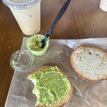 K Brew - Avocado spread on a bagel. Iced latte with oatmilk and honey. - Coffee & Tea Near Me - Knoxville, Tennessee