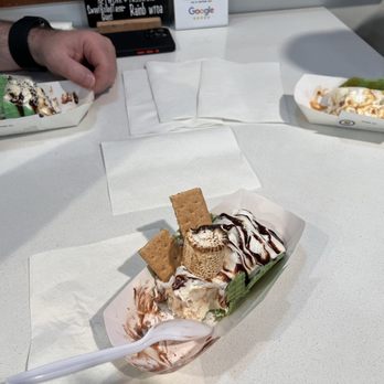 Sweet Rolled Tacos - On the left is coconut delight. In front is s'mores galore. And on the right is a seasonal flavor: praline pecan. They were all delicious!! - Ice Cream & Frozen Yogurt Near Me - Riverton, Utah