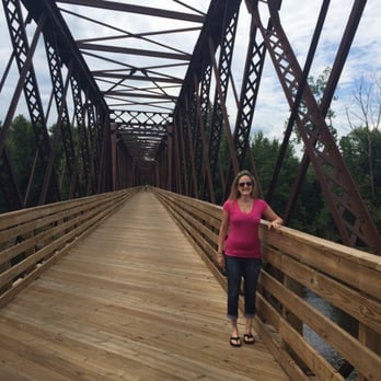 Norwottuck Rail Trail - Me standing on the beautiful re done bike trail bridge - Parks Near Me - Northampton, Massachusetts