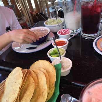 Potzolcano - The spread of garnishes - Mexican Near Me - Santa Ana, California