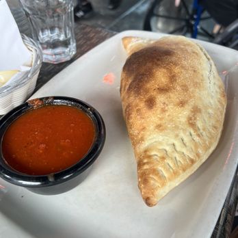 Eden Trattoria - Baked calzone - Italian Near Me - Etobicoke, Ontario Eden Trattoria - Baked calzone - Italian Near Me - Etobicoke, Ontario