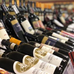 rows of wine bottles rows of wine bottles