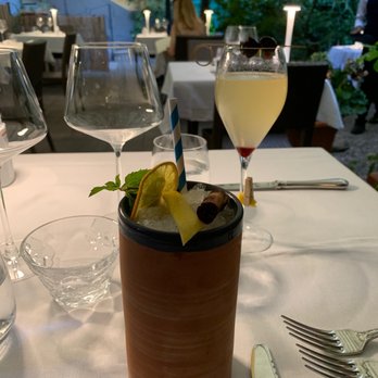 L'osteria Della Corte - A Siesta (front) and a French 75 (back) - Italian Near Me - La Spezia, SP L'osteria Della Corte - A Siesta (front) and a French 75 (back) - Italian Near Me - La Spezia, SP