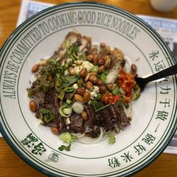 Fengying Guilin Rice Noodles - Crispy pork and beef rib meat with rice noodles. Added spicy red and a green chili sauce. Both were delicious.
