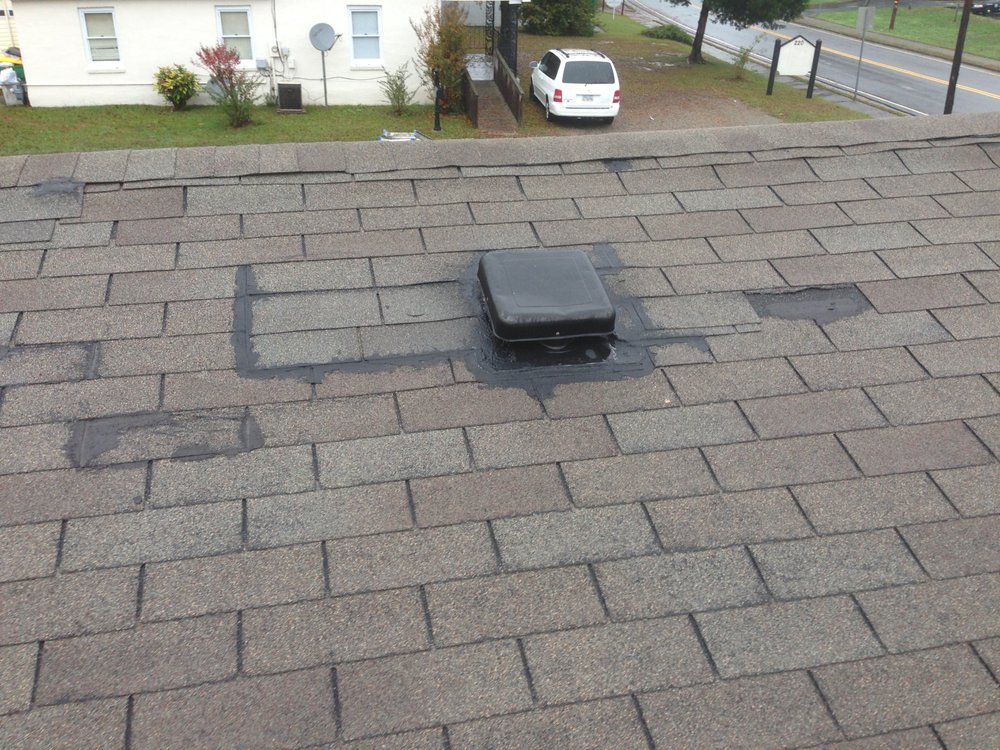 Slide of Dave Clark Roofing